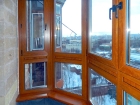 Остекление балкона деревянными окнами под ключ 